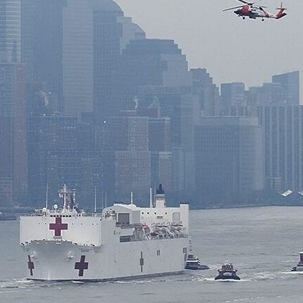 USNS Comfort enters New York - USCG helicopter top right