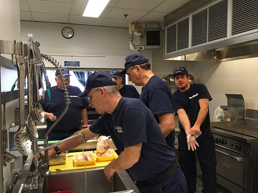 Flotilla members participating in Food Service training