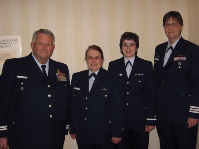 4 Auxiliary Officers at a conference