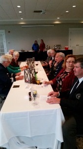Members and their guests at the east table prior to dinner