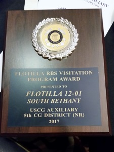 The plaque award reads "Flotilla RBS Visitation Program Award Presented to Flotilla 12-01 South Bethany USCG Auxiliary 5th CG District (NR) 2017"
