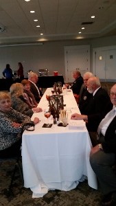 Members and guests at the west table prior to dinner