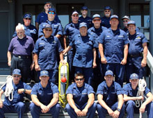 The class at the Lewes Coast Guard Station: Top Left to Right: Bob Bradish, Marianne Bernardi, Marti Inteli, Leslie Hegamaster, Jamie Tourison, Len Gerhart, Fred Zikas, Denny Nield, Alan Boucher, Dave Hermansader, Angelo Caputo, BM2 Coleman, Don Gerhart, Al Grimminger, FN Sosa, BM2 Thurman, BM3 Strack, FN McIntrye