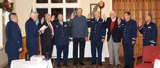 Seven USCG Flotilla 12-09 Auxiliary elected and appointed Officers for 2017 were initiated by District Commander Warren Hoff as over-seen by Coast Guard BMC Jim Pond, Chief of CG Station Indian River. l-r: USCG BMC Jim Pond; CG Auxiliary DVDR Warren Huff;– IPFC John Umbel ; VE Bill Tower; PV Jim LaValley; VFC Roy Zimmerman; PE Andy Smith; CS John Ballantyne; FC Richard Stevenson.
