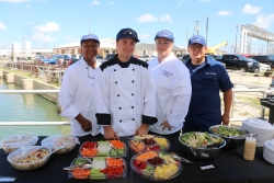 Auxiliary Food Service specialists serving a buffet