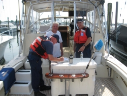 16-08 members conducting Vessel Safety Exam