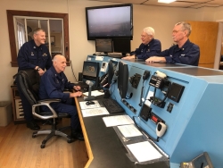 Auxiliary watchstanders at a Coast Guard Station