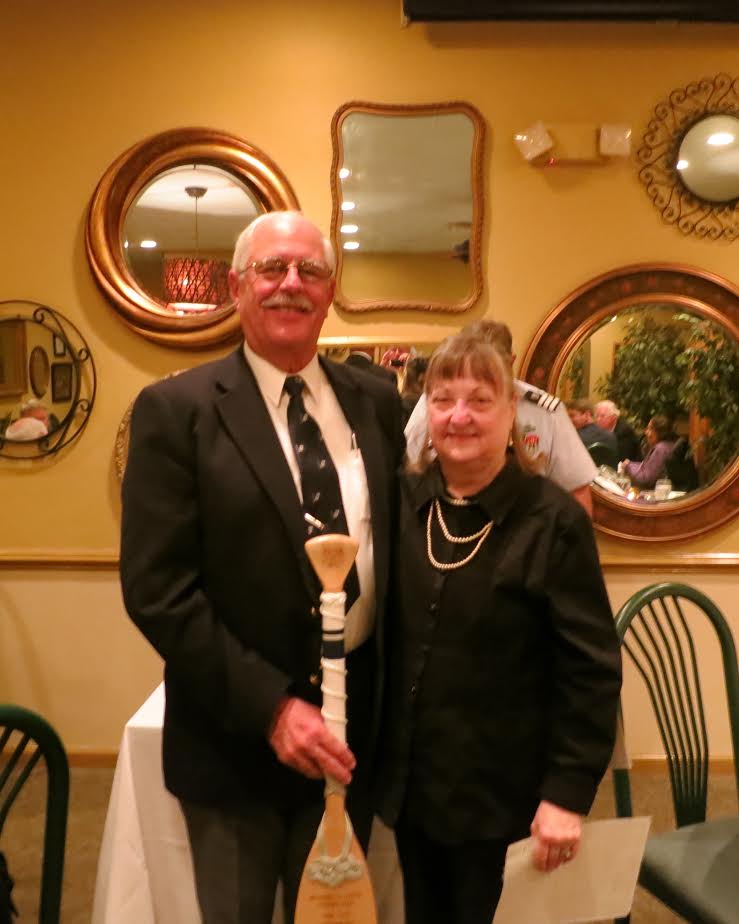 Bob & Lydie Crewdson with retirement paddle