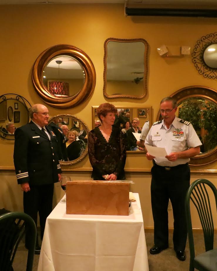 Marilyn Oesterling receiving ACLOC (Aux Commandant's Letter of Commendation)