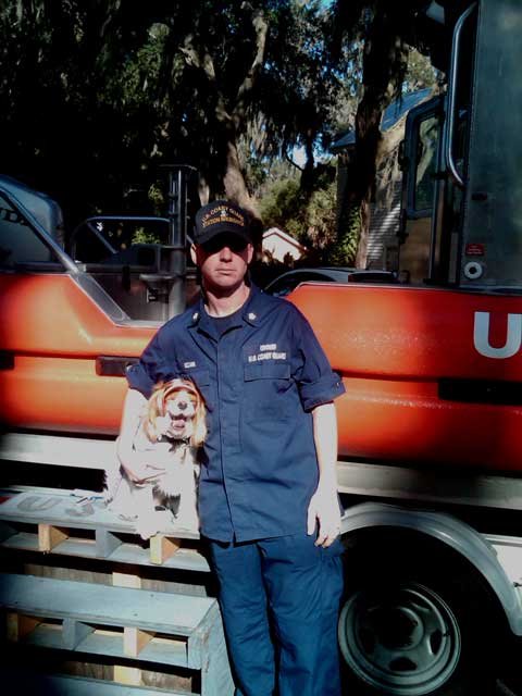 COAST GUARD OFFICER AND DOGGIE FRIEND
