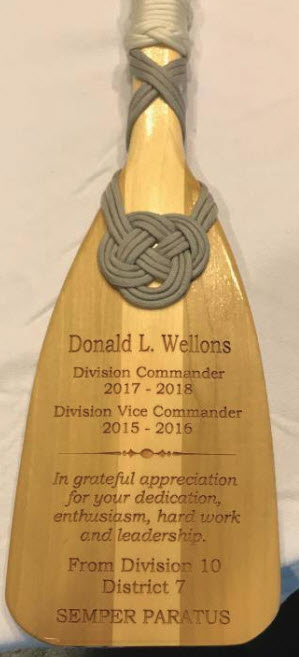 The USCGA Commander paddle service award presented to Don.