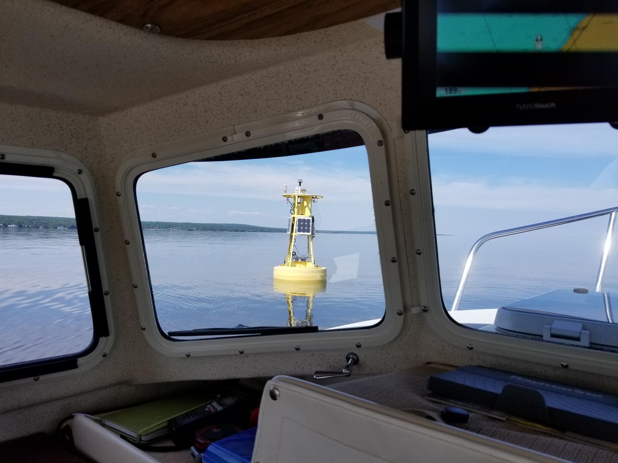 Verifying position of weather buoy on Lake Superior