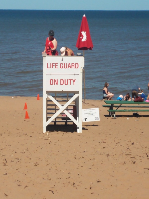 new life jacket loaner sign at the beach