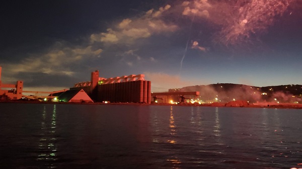 silos lit up by fireworks