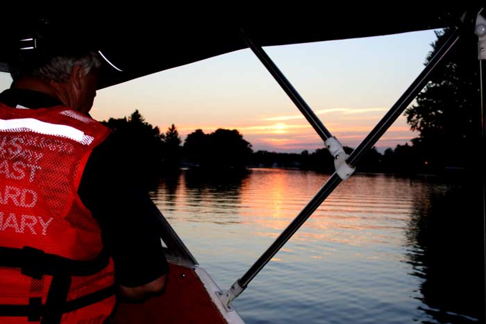 Rikki Too owner and FC Rick Kunz at the helm, taking her home at sunset