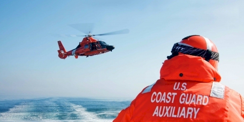 Auxiliary Member training with Coast Guard helicopter