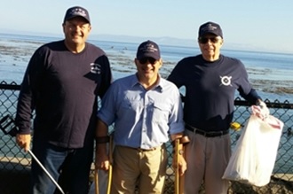 Rob Jackson, Alex Urciuoli & Keith Simmons participate in the annual Coastal Cleanup, September 2018