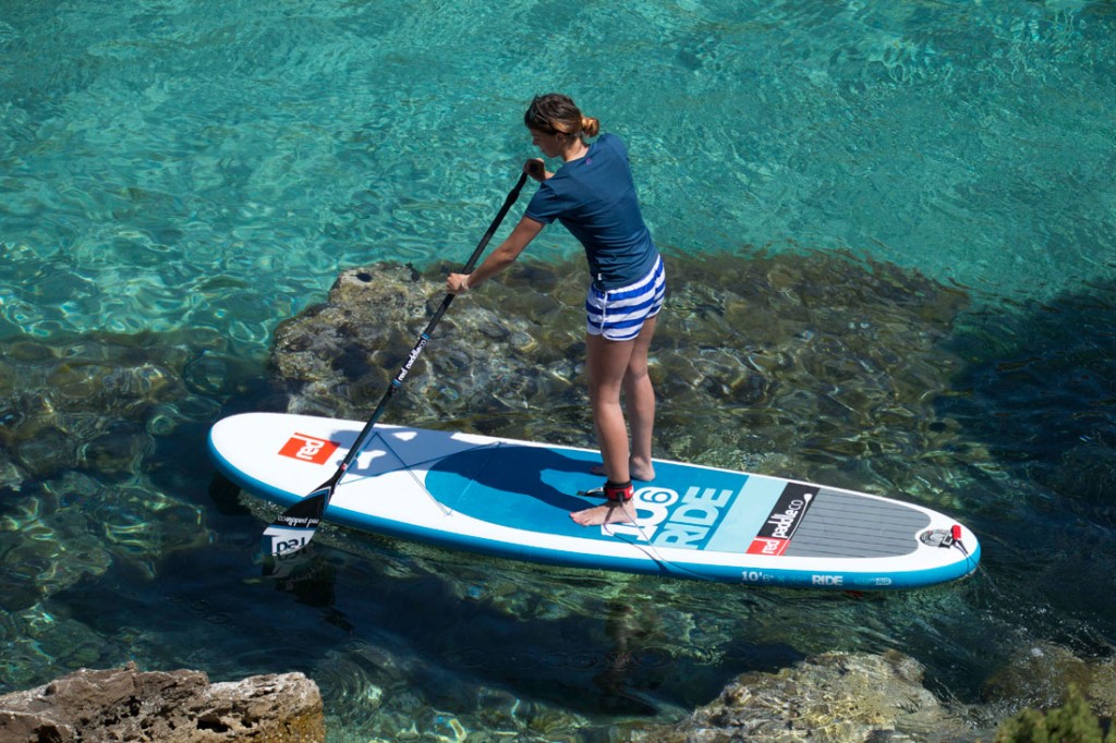 Picture of person on a Stand-up board.