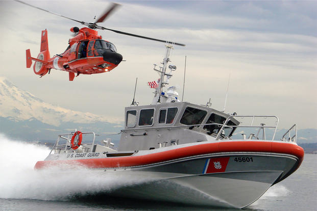 Coast Guard boat and helicopter