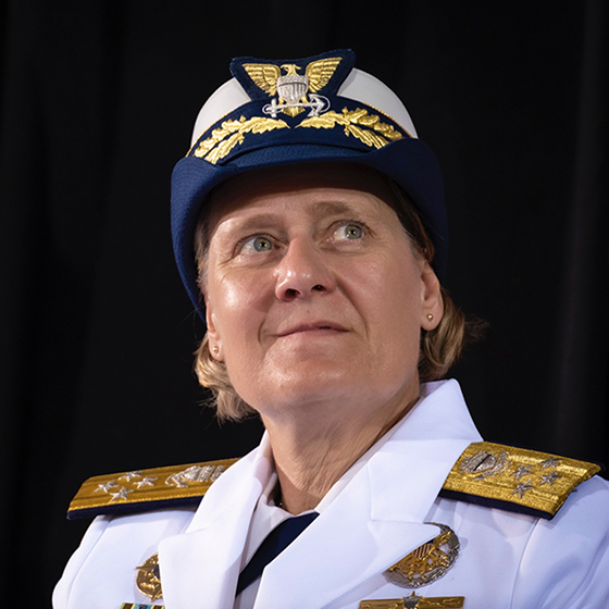 Closeup of Adm. Linda Fagan; she is wearing a white uniform and hat