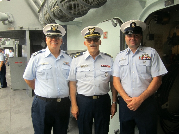 Charles Poltenson, Richard Walker and BMC Jason Cross aboard the USS Slater