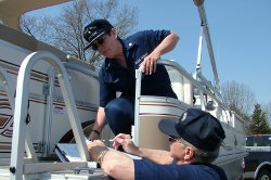 Auxiliarists conduct a vessel safety check