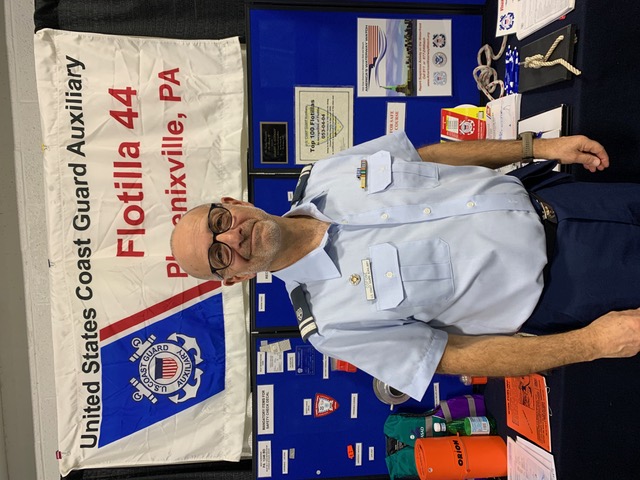 another Auxiliary member at boat show booth