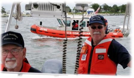 Andy Smith (L) and Denny Nield prepare for a towing excercise with the CG crew from Station Indian River, Delaware.