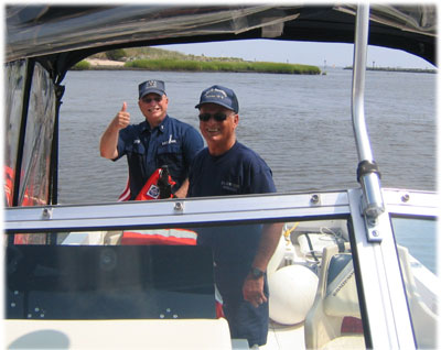 Coast Guard Auxiliarists enjoynig patrol on the Delaware Bay.