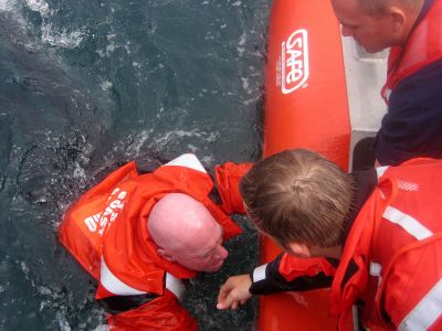 Coast Guard Auxilarists performing a simulated rescue.