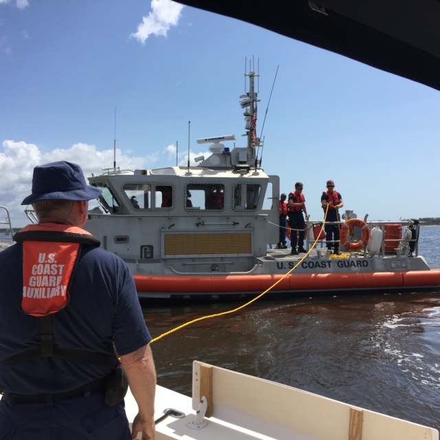 Auxiliarists working with Coast Guard