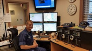 Coast Guard and Flotilla members monitor radio communications for vessels in distress