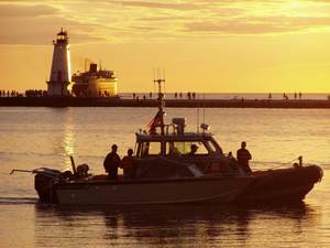 Coast Guard boat, Liudington Lighthouse, and S.S. Badger