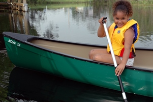 kid in canoe