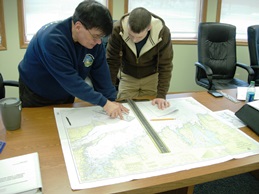 trainees working in navigation chart