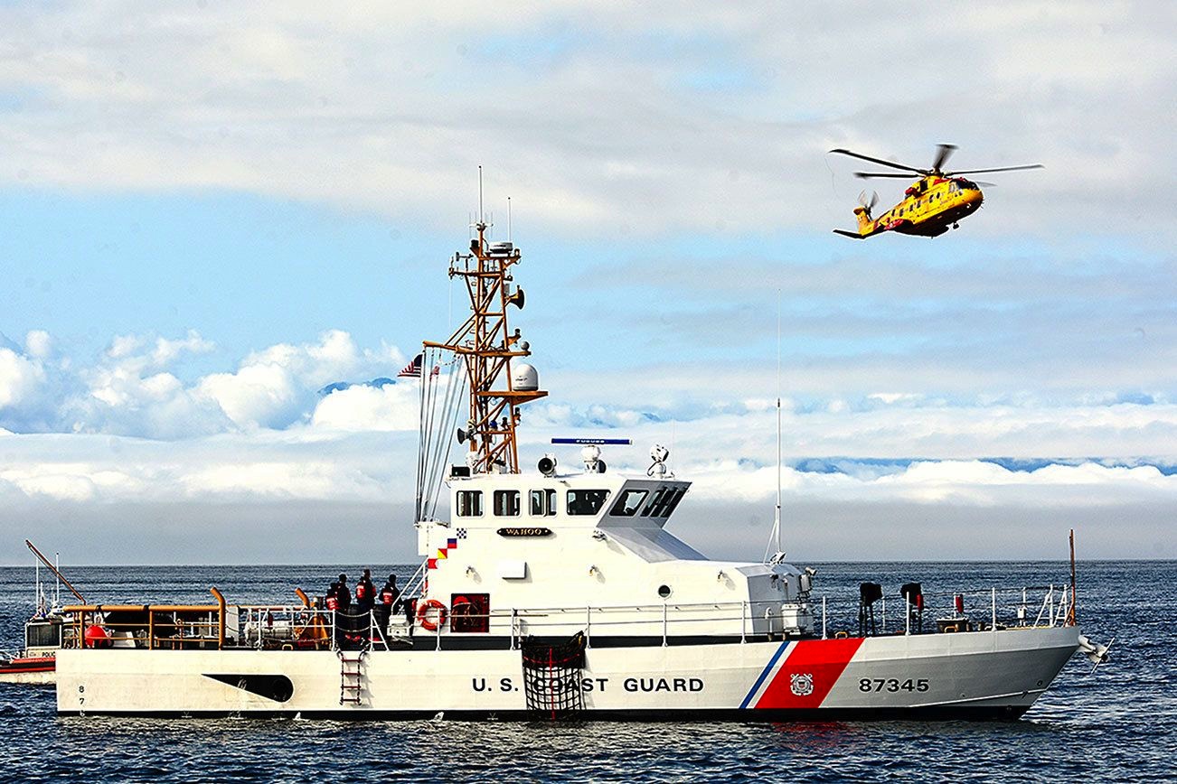 Coast Guard Cutter and Helicopter